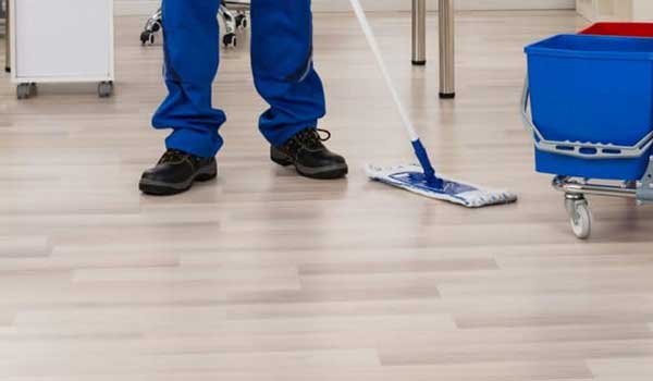 Cleaning white wash laminate flooring using a mop 