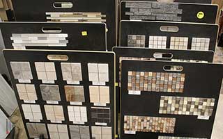 Stone flooring samples of various colors and patterms