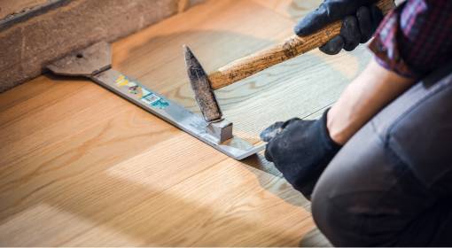carpenter installing a floor